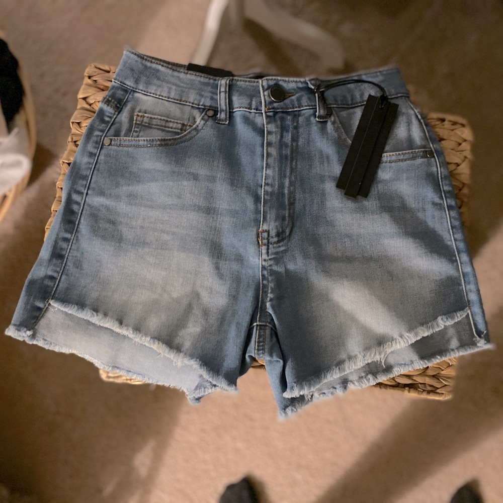 High waist super stretch high low cut off shorts. new